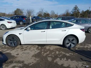 2023 Tesla Model 3 z VIN 5YJ3E1EA4PF505850, wystawiony jako IAAI lot #41310597 z przebiegiem 70 211 mil mil oraz . Historia ofert i sprzedaży dostępna na DreamBid. Obrazek 14.