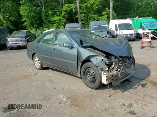 2004 Toyota Camry LE with VIN 4T1BE30K04U290232, listed as a Copart auction lot 59788975 with Not provided miles and Salvage title. Bid and sale history available at DreamBid. Image 13.