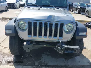 2021 Jeep Wrangler Unlimited Willys with VIN 1C4HJXDN1MW616467, listed as a IAAI auction lot 41791928 with 88,618 mi miles and . Bid and sale history available at DreamBid. Image 12.