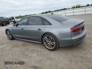 2017 Audi A8 z VIN WAU44AFD1HN009176, wystawiony jako Copart lot #57647675 z przebiegiem 94 317 mil mil oraz Szkoda całkowita • Salvage title. Historia ofert i sprzedaży dostępna na DreamBid. Obrazek 2.