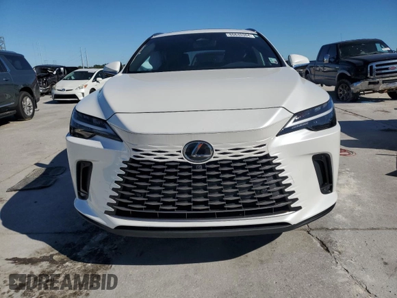 2023 Lexus RX with VIN JTJCHMAA7P2005597, listed as a Copart auction lot 80840304 with 4,797 mi miles and Salvage Title. Bid and sale history available at carsss.com. Image 5.