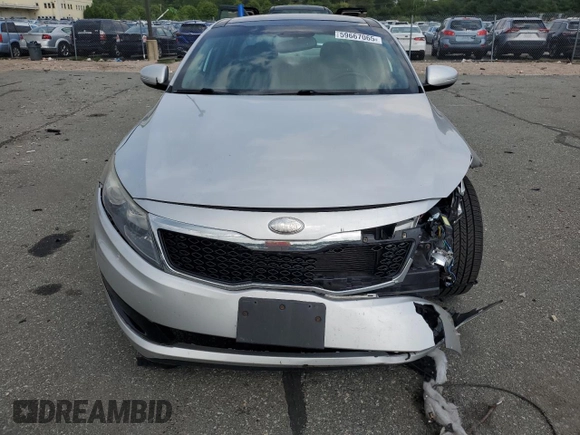 2013 Kia Optima EX z VIN 5XXGN4A79DG217554, wystawiony jako Copart lot #59667065 z przebiegiem 102 482 mil mil oraz Szkoda całkowita • Salvage title. Historia ofert i sprzedaży dostępna na DreamBid. Obrazek 5.