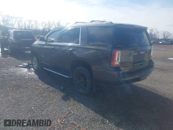 2016 GMC Yukon SLE with VIN 1GKS2AKC9GR273724, listed as a IAAI auction lot 41945761 with 141,425 mi miles. Bid and sale history available at carsss.com. Image 3.