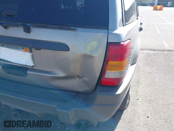 2002 Jeep Grand Cherokee with VIN 1J8GW48N72C207838, listed as a IAAI auction lot 42020294 with 181,283 mi miles and . Bid and sale history available at DreamBid. Image 6.