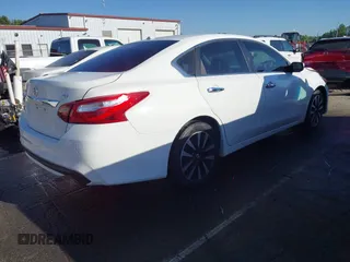 2018 Nissan Altima SR with VIN 1N4AL3AP0JC206823, listed as a IAAI auction lot 42024030 with 119,647 mi miles and . Bid and sale history available at carsss.com. Image 4.
