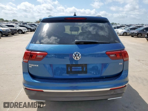2018 Volkswagen Tiguan SEL z VIN 3VV3B7AX9JM191509, wystawiony jako Copart lot #61357405 z przebiegiem 209 934 mil mil oraz Czysty tytuł • Clean title. Historia ofert i sprzedaży dostępna na DreamBid. Obrazek 6.