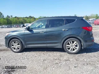 2013 Hyundai Santa Fe Sport z VIN 5XYZUDLA6DG019790, wystawiony jako IAAI lot #41980044 z przebiegiem 282 456 mil mil oraz . Historia ofert i sprzedaży dostępna na DreamBid. Obrazek 14.