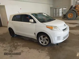 2008 Scion xD with VIN JTKKU10488J002731, listed as a IAAI auction lot 41767986 with 217,135 mi miles. Bid and sale history available at carsss.com. Image 1.
