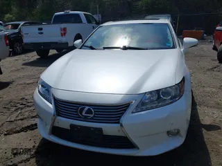 2013 Lexus ES 300h Hybrid with VIN JTHBW1GG1D2038698, listed as a IAAI auction lot 42173883 with 253,281 mi miles. Bid and sale history available at carsss.com. Image 11.