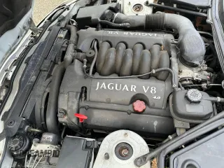 1999 Jaguar XK z VIN SAJGX2048XC041933, wystawiony jako Copart lot #44338125 z przebiegiem 67 133 mil mil oraz Tytuł czysty. Historia ofert i sprzedaży dostępna na DreamBid. Obrazek 7.