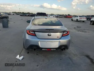 2023 Toyota GR86 with VIN JF1ZNBC17P8760338, listed as a Copart auction lot 77890934 with 0 mi miles and Salvage Title. Bid and sale history available at carsss.com. Image 6.