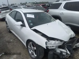 2010 Pontiac G6 1SB z VIN 1G2ZA5E04A4127584, wystawiony jako IAAI lot #36772381 z przebiegiem Nie podano mil oraz . Historia ofert i sprzedaży dostępna na DreamBid. Obrazek 1.