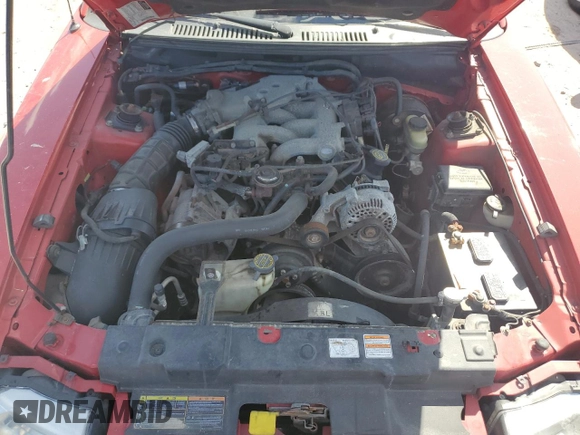1999 Ford Mustang z VIN 1FAFP4443XF106725, wystawiony jako Copart lot #77011284 z przebiegiem Nie podano mil oraz Szkoda całkowita • Salvage title. Historia ofert i sprzedaży dostępna na DreamBid. Obrazek 11.