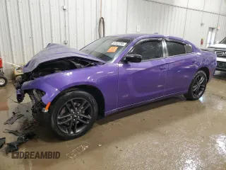 2019 Dodge Charger SXT with VIN 2C3CDXJG6KH693424, listed as a Copart auction lot 87527295 with 55,914 mi miles and Salvage Title. Bid and sale history available at DreamBid. Image 1.