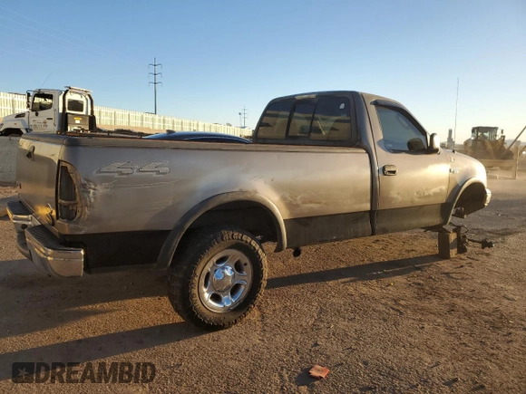 2002 Ford F-150 XL with VIN 1FTRF18262NB35586, listed as a Copart auction lot 77114114 with 166,942 mi miles and Salvage title. Bid and sale history available at DreamBid. Image 3.