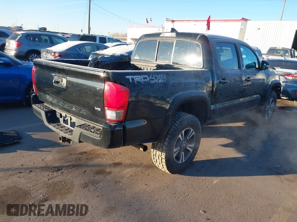 2016 Toyota Tacoma SR with VIN 3TMCZ5AN0GM023263, listed as a IAAI auction lot 41302069 with 137,276 mi miles and . Bid and sale history available at DreamBid. Image 4.