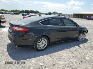 2013 Ford Fusion SE Hybrid with VIN 3FA6P0LU7DR288731, listed as a Copart auction lot 63902215 with 124,176 mi miles and Salvage title. Bid and sale history available at DreamBid. Image 3.