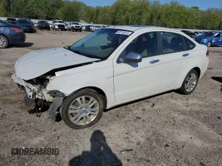 2010 Ford Focus SEL with VIN 1FAHP3HN1AW149134, listed as a Copart auction lot 52318815 with 244,171 mi miles and Salvage Title. Bid and sale history available at carsss.com. Image 1.