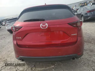 2021 Mazda CX-5 Touring with VIN JM3KFACM7M0334633, listed as a Copart auction lot 51618875 with 70,558 mi miles and Salvage Title. Bid and sale history available at DreamBid. Image 6.