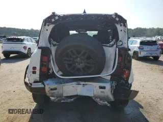 2025 Land Rover Defender S with VIN SALEJ7EX8S2383610, listed as a Copart auction lot 61796155 with 12,666 mi miles and Salvage title. Bid and sale history available at DreamBid. Image 6.