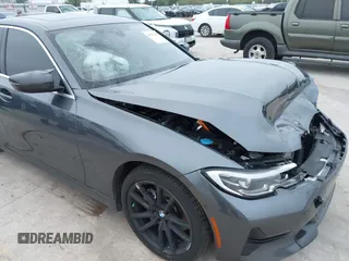 2021 BMW 3 Series 330i with VIN 3MW5R1J09M8C15403, listed as a IAAI auction lot 41892341 with 30,975 mi miles and . Bid and sale history available at carsss.com. Image 17.