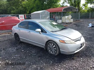 2006 Honda Civic LX with VIN 1HGFA16536L051811, listed as a IAAI auction lot 42281038 with 320,811 mi miles and . Bid and sale history available at DreamBid. Image 1.