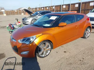 2013 Hyundai Veloster w/Gray Int with VIN KMHTC6AD6DU122025, listed as a IAAI auction lot 41551623 with 189,793 mi miles. Bid and sale history available at carsss.com. Image 2.