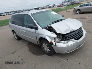 2006 Chrysler Town & Country Touring z VIN 2A4GP54L96R730719, wystawiony jako IAAI lot #42363419 z przebiegiem 186 173 mil mil oraz . Historia ofert i sprzedaży dostępna na DreamBid. Obrazek 1.