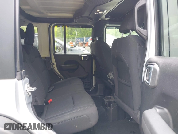 2023 Jeep Wrangler Sport S с VIN 1C4HJXDN0PW511682, выставлен на аукционе IAAI как лот 42199890 с пробегом 29 061 миль миль и . История ставок и продаж доступна на DreamBid. Изображение 8.