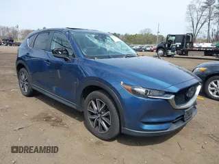2018 Mazda CX-5 Touring z VIN JM3KFBCM3J0355416, wystawiony jako IAAI lot #42128715 z przebiegiem 172 796 mil mil oraz . Historia ofert i sprzedaży dostępna na DreamBid. Obrazek 1.