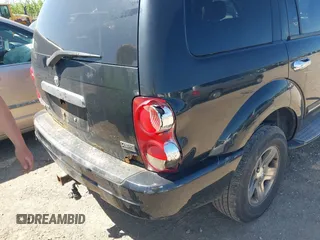 2005 Dodge Durango Limited z VIN 1D8HB58D55F509489, wystawiony jako IAAI lot #42132823 z przebiegiem 162 155 mil mil oraz . Historia ofert i sprzedaży dostępna na DreamBid. Obrazek 6.