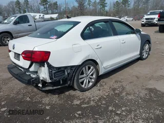 2012 Volkswagen Jetta GLI Autobahn with VIN 3VW567AJ8CM366548, listed as a IAAI auction lot 41684033 with 259,383 mi miles and . Bid and sale history available at DreamBid. Image 4.