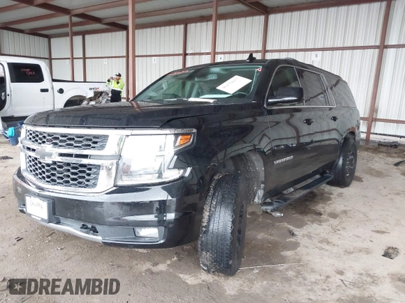 2020 Chevrolet Suburban LT z VIN 1GNSKHKC4LR304237, wystawiony jako IAAI lot #41179977 z przebiegiem 94 302 mil mil oraz . Historia ofert i sprzedaży dostępna na DreamBid. Obrazek 16.