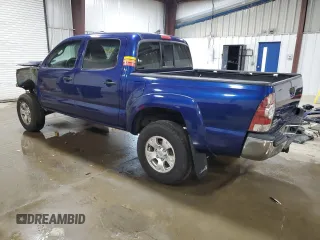 2015 Toyota Tacoma with VIN 3TMLU4EN6FM186016, listed as a Copart auction lot 58404675 with 127,536 mi miles and Salvage title. Bid and sale history available at DreamBid. Image 2.