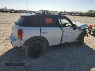 2011 MINI Countryman with VIN WMWZB3C59BWH94541, listed as a Copart auction lot 87177514 with 186,979 mi miles and Salvage title. Bid and sale history available at DreamBid. Image 3.