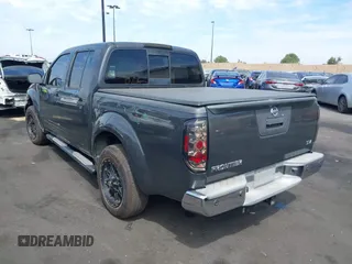 2014 Nissan Frontier SV with VIN 1N6AD0ER8EN756702, listed as a IAAI auction lot 42021294 with 135,143 mi miles and . Bid and sale history available at DreamBid. Image 15.