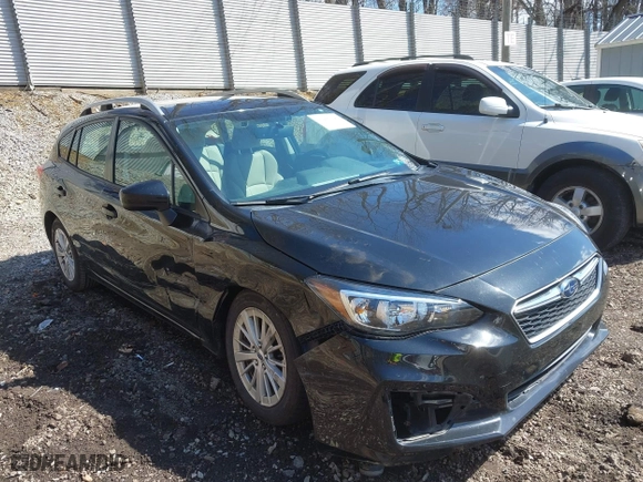 2017 Subaru Impreza Premium with VIN 4S3GTAD65H3716428, listed as a IAAI auction lot 41942299 with 77,181 mi miles. Bid and sale history available at carsss.com. Image 1.