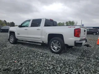 2017 Chevrolet Silverado 1500 High Country with VIN 3GCUKTEJ6HG124280, listed as a Copart auction lot 51486285 with 132,268 mi miles and Salvage Title. Bid and sale history available at carsss.com. Image 2.
