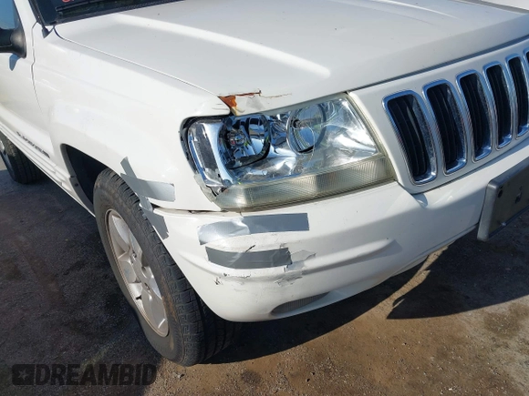 2001 Jeep Grand Cherokee Limited with VIN 1J4GW58S41C615418, listed as a IAAI auction lot 42141143 with 148,145 mi miles. Bid and sale history available at carsss.com. Image 6.