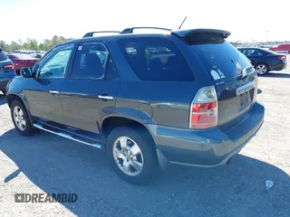 2004 Acura MDX with VIN 2HNYD18234H508252, listed as a IAAI auction lot 41792452 with 336,087 mi miles. Bid and sale history available at carsss.com. Image 3.