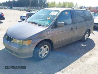 2000 Honda Odyssey EX with VIN 2HKRL1863YH008265, listed as a IAAI auction lot 42041096 with 157,694 mi miles and . Bid and sale history available at DreamBid. Image 2.