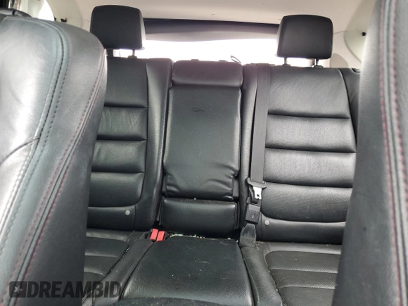 2016 Mazda CX-5 Grand Touring z VIN JM3KE4DY5G0741800, wystawiony jako Copart lot #58565455 z przebiegiem 33 675 mil mil oraz Szkoda całkowita • Salvage title. Historia ofert i sprzedaży dostępna na DreamBid. Obrazek 10.