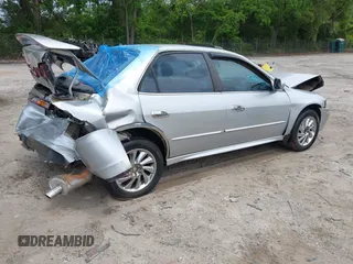 2002 Honda Accord SE z VIN 1HGCG56792A109226, wystawiony jako IAAI lot #42155995 z przebiegiem 238 789 mil mil oraz . Historia ofert i sprzedaży dostępna na DreamBid. Obrazek 4.