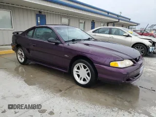 1996 Ford Mustang GT z VIN 1FALP42X8TF196321, wystawiony jako Copart lot #50874885 z przebiegiem 86 945 mil mil oraz Szkoda całkowita • Salvage title. Historia ofert i sprzedaży dostępna na DreamBid. Obrazek 4.