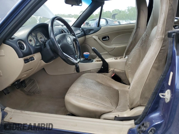 2003 Mazda MX-5 Miata Cloth with VIN JM1NB353230312023, listed as a Copart auction lot 53968875 with 174,252 mi miles and Salvage title. Bid and sale history available at DreamBid. Image 7.