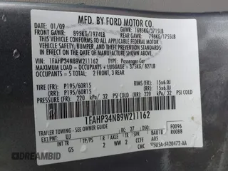 2009 Ford Focus S with VIN 1FAHP34N89W211162, listed as a IAAI auction lot 41677415 with 94,597 mi miles. Bid and sale history available at carsss.com. Image 9.