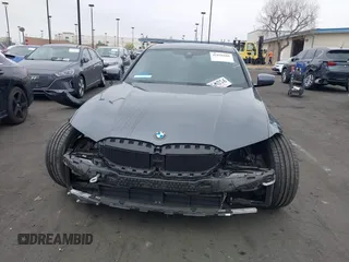 2022 BMW 3 Series 330i z VIN 3MW5R1J01N8C33802, wystawiony jako IAAI lot #41856666 z przebiegiem 41 095 mil mil oraz . Historia ofert i sprzedaży dostępna na DreamBid. Obrazek 13.