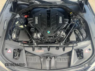 2015 BMW 7 Series 750i xDrive with VIN WBAYB6C5XFD965910, listed as a Copart auction lot 47488765 with 173,486 mi miles and Salvage Title. Bid and sale history available at carsss.com. Image 14.