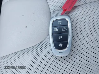2024 Hyundai Palisade Limited z VIN KM8R5DGE1RU725867, wystawiony jako IAAI lot #41790529 z przebiegiem 33 869 mil mil oraz . Historia ofert i sprzedaży dostępna na DreamBid. Obrazek 11.