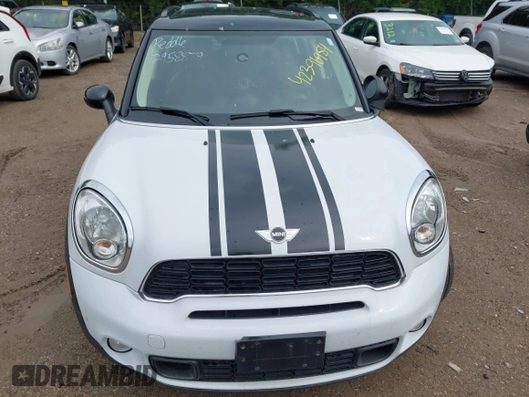 2014 MINI Countryman S z VIN WMWZC5C5XEWP37470, wystawiony jako IAAI lot #42396984 z przebiegiem 77 847 mil mil oraz . Historia ofert i sprzedaży dostępna na DreamBid. Obrazek 6.